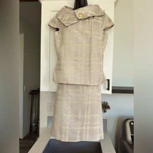 Beautiful suit for special occasion or the office. Jacket and skirt.